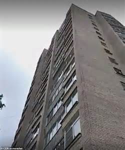 russian woman killed after couple fall from 9th floor