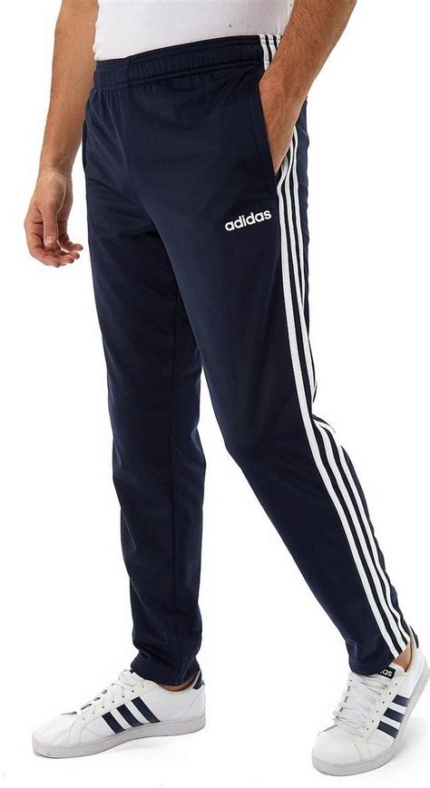 bolcom adidas essentials  stripes tricot joggingbroek blauw heren