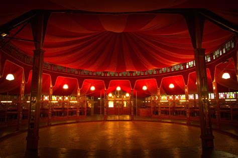 inside circus tent and a circus tent without a circus
