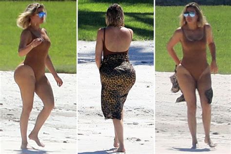 khloe kardashian shows off her curves in sexy swimsuit after two stone weight loss
