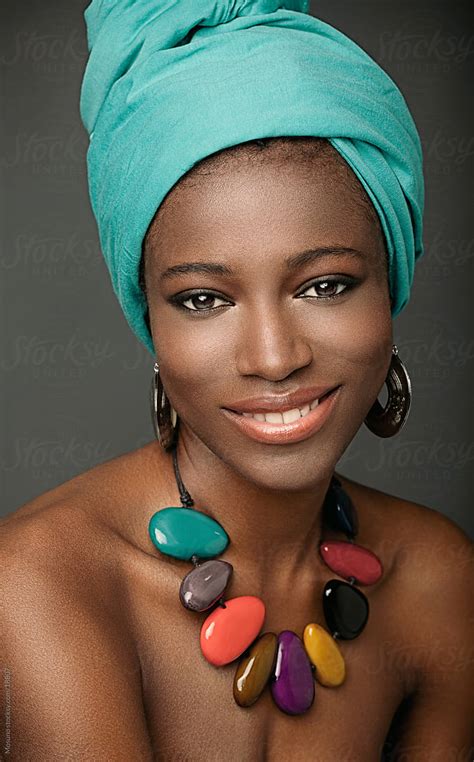 Black Woman With White Turban On Her Head By Stocksy Contributor