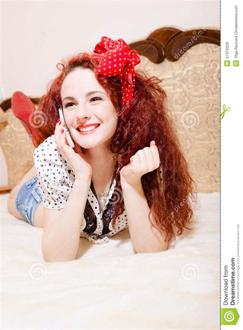 Sexi Redhead Woman With Long Hair Talking On Phone Stock