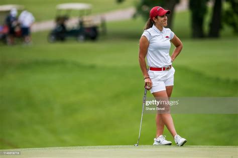 maria fassi of the university of arkansas smiles after sinking a putt news photo getty images