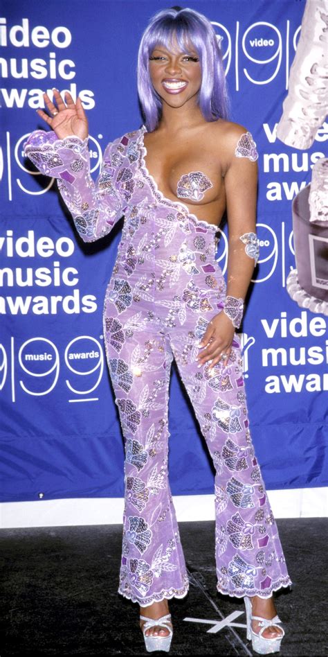 Lil Kim S Most Outrageous Outfits Essence