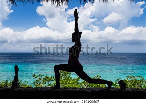yoga positions  beach  curacao stock photo edit