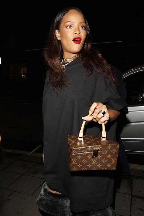 rihanna s reaction to kanye west s ‘famous music video — chris brown is hotter hollywood life
