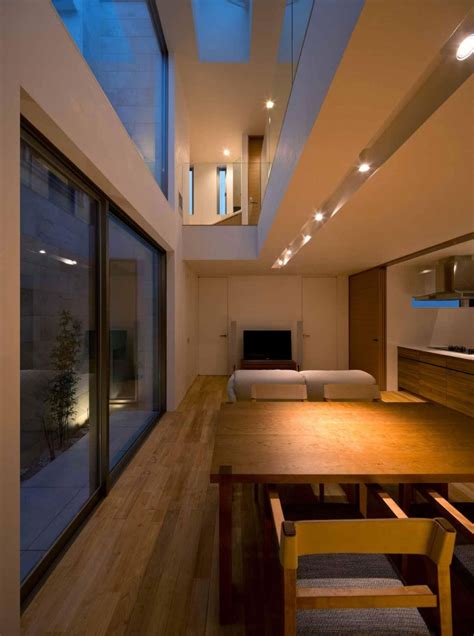minimalist japanese residence blends privacy   airy interior