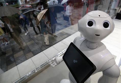 human  robot unveiled  japan