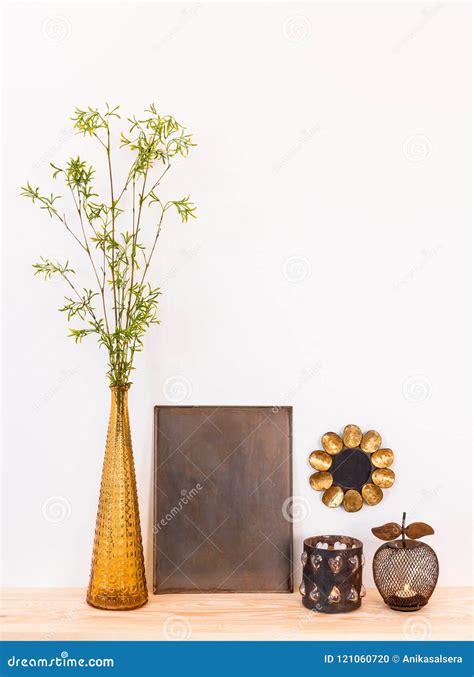 home decor composition  tree branches  metal objects stock photo