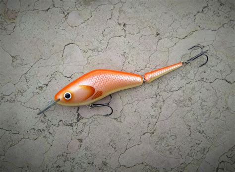 custom fishing lure handmade jointed wooden lure orange etsy