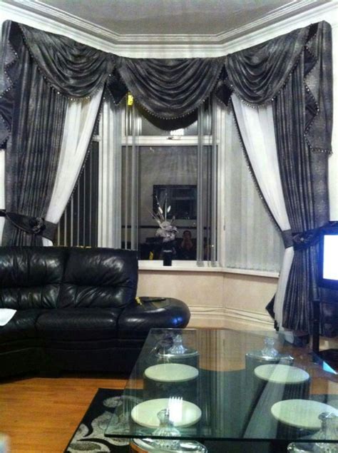 bay window swags       modified  work    gaudy  curtains