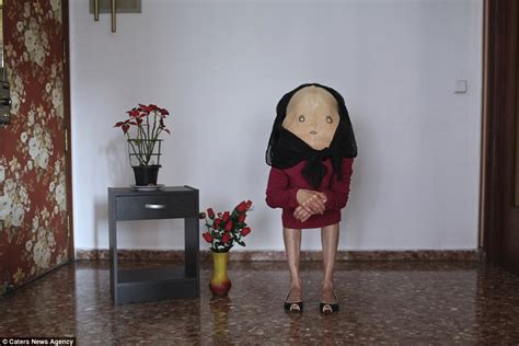 Anahell S Bizarre Photographs See Models Bent Over With Faces Drawn On