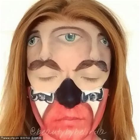 make up artist creates special effects on her face[10] art