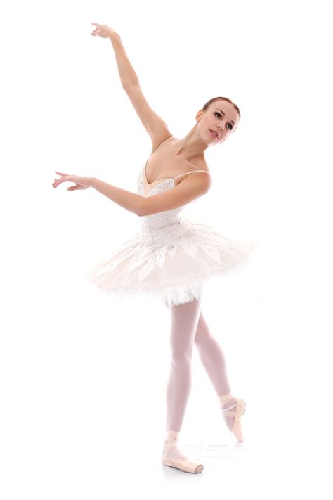 Beautiful And Gorgeous Ballerina In Ballete Pose Free Photo