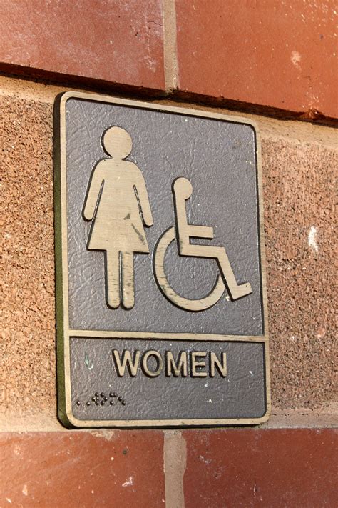 womens restroom sign brass plaque picture  photograph