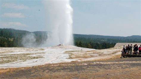 mich woman videos man appearing to pee on old faithful