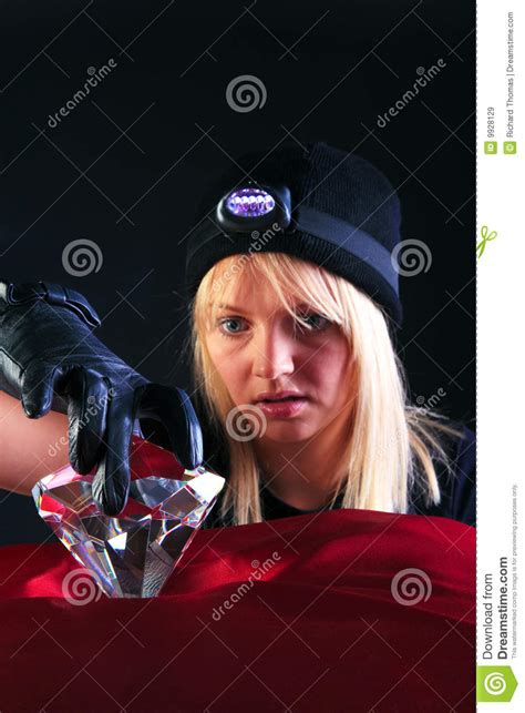 Blond Woman Cat Burglar Stealing A Large Diamond Stock Image Image