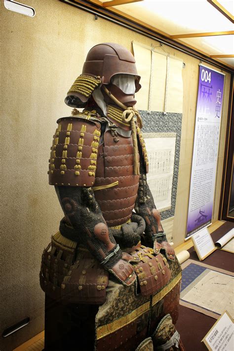 a suit of armour on display in matsuyama castle samurai