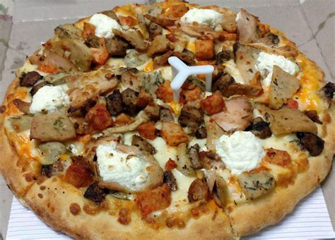 dominos  range  quattro formaggi burst pizzas  delhi