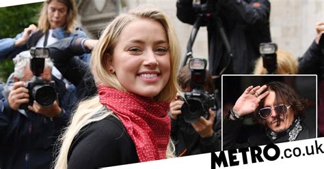 amber heard pictured smiling at johnny depp libel trial metro news