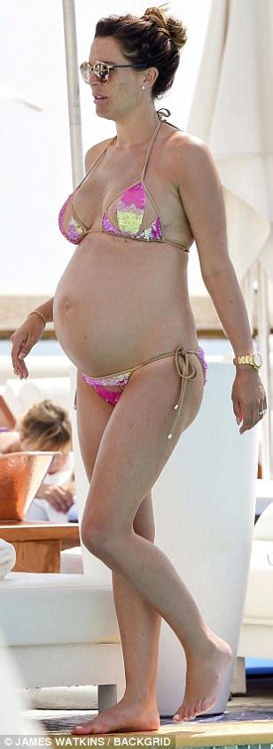 pregnant danielle lloyd cradles her huge bump in monaco daily mail online