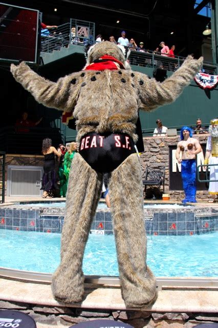 there s a dude in a poseidon costume protecting the chase field pool