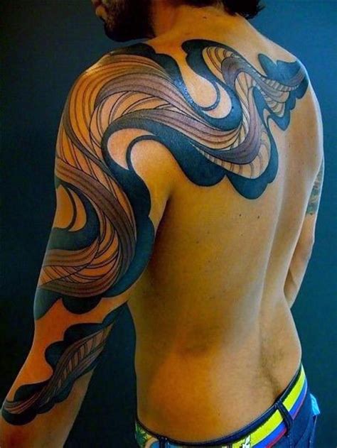 Big Tribal Style Colored Mystic Ornament Tattoo On Sleeve And Upper