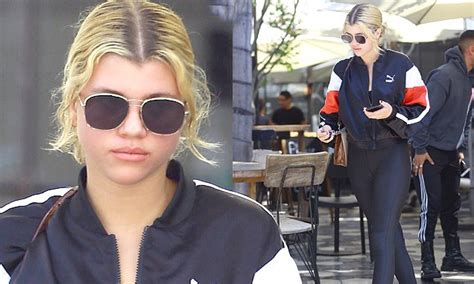 sofia richie wears fuzzy house slippers with socks daily mail online