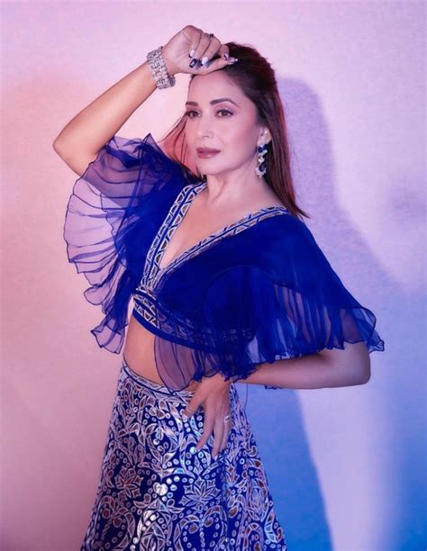 madhuri dixit is gleaming with beauty in electric hues of blue
