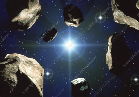 asteroids orbiting  sun stock image  science photo