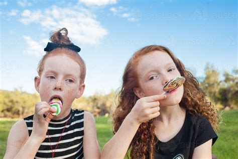Austock000045728 Rainbow Lollipops Girl Two Girls