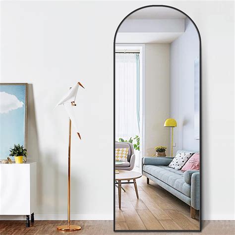 pexfix      modern arched shape framed black standing mirror full length floor mirror