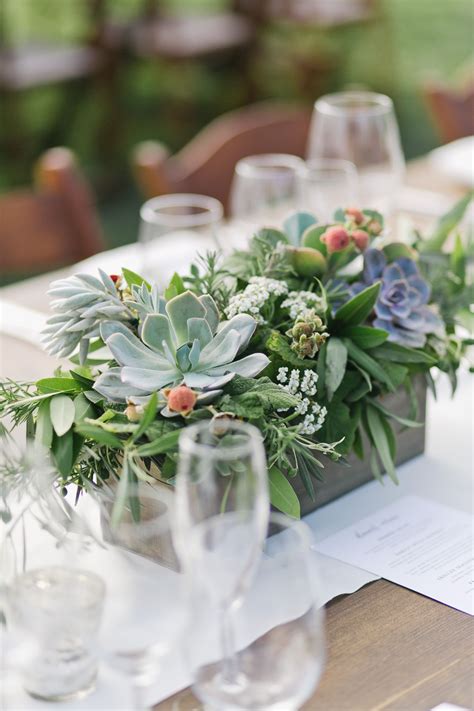 totally twisted wedding table centerpieces  flowers