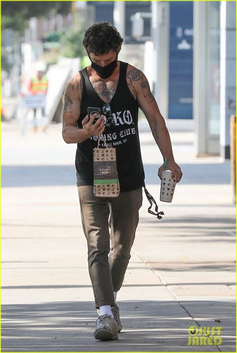 shia labeouf is looking so muscular in his tank top photo