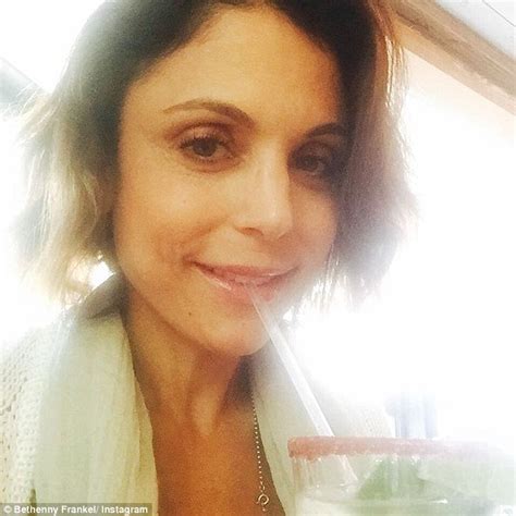 bethenny frankel brags about a hot guy sending her a drink at a bar in instagram selfie daily