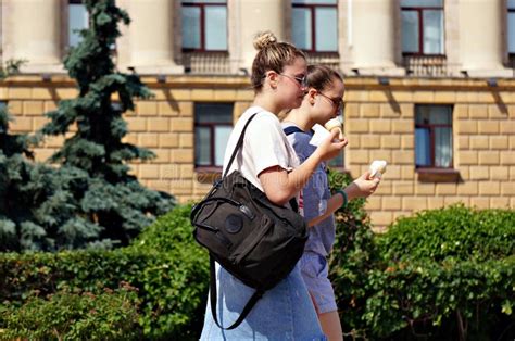 russia penza girls walk around the city and eat ice cream editorial