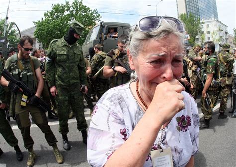 ukrainian choppers blast defiant rebels at donetsk airport after