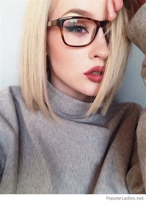 short blonde hair glasses and red lips