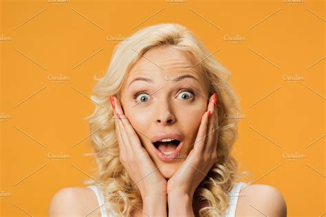 Shocked Blonde Woman Looking At Came High Quality People Images