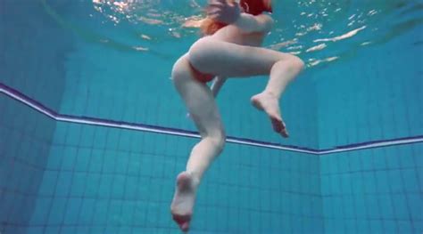 Swimming Redhead Strips Underwater To Tease Us Redhead Porn
