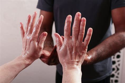 oil on the hands of massage therapists preparation for massage massage