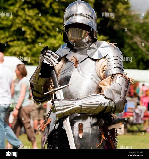 man wearing suit  armor   castle green hereford uk medieval