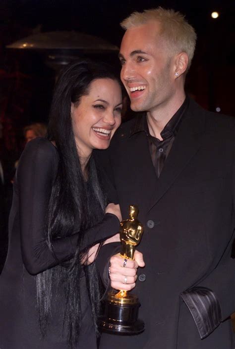 angelina jolie and brother james kiss 2000 photos most memorable moments from the oscars