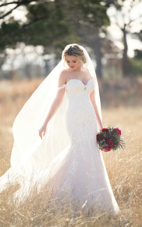 blush wedding dress with rich lace essense of australia
