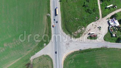 flying vertically  car driving  road stock footage video  plane aerial