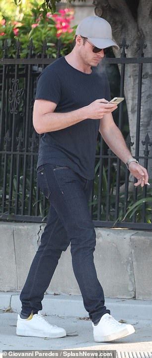 Richard Madden Cuts A Casual Figure As He Puffs On A