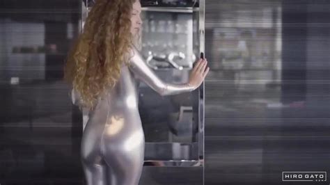 girl posing in shiny silver spandex catsuit porn videos