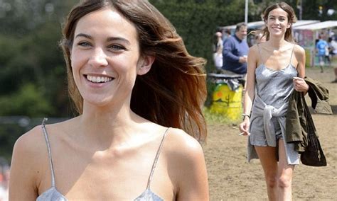 alexa chung shimmers at glastonbury in silver space age short jumpsuit