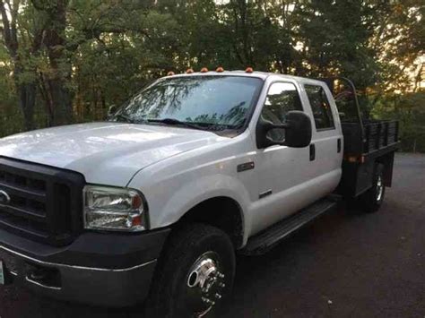 ford   diesel crew cab flatbed dually  utility service trucks