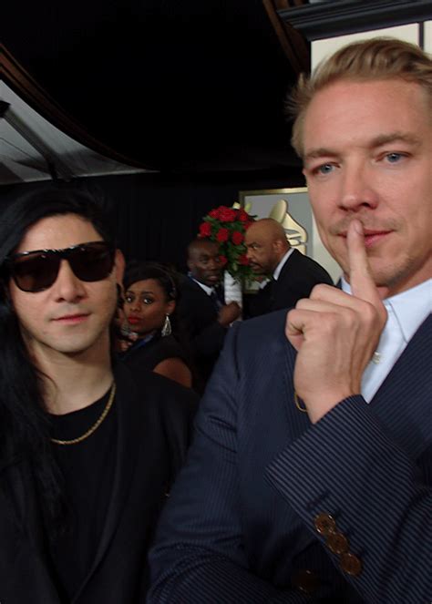 skrillex and diplo take a selfie at the 58th grammy awards